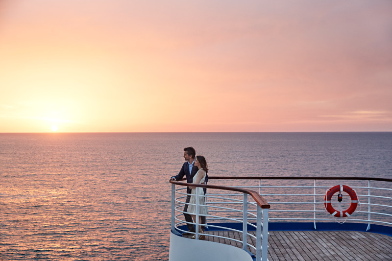 Couple enjoying the sunset on a Princess ship