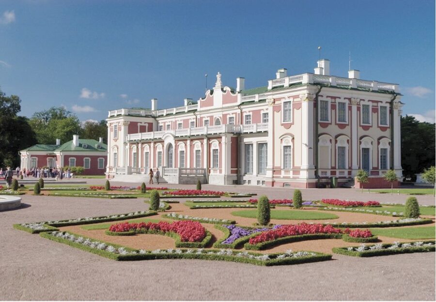 Kadriorg Palace in Tallinn, featuring a pink and white facade and formal gardens.