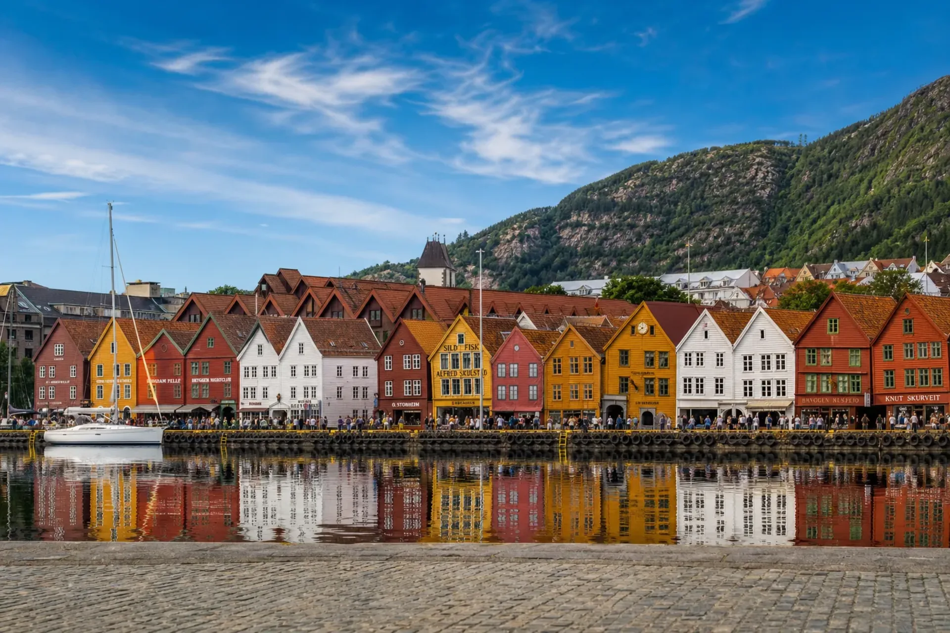 Norway-The colourful Hanseatic buildings of Bryggen Wharf on a sunny Bergen Norway tour.