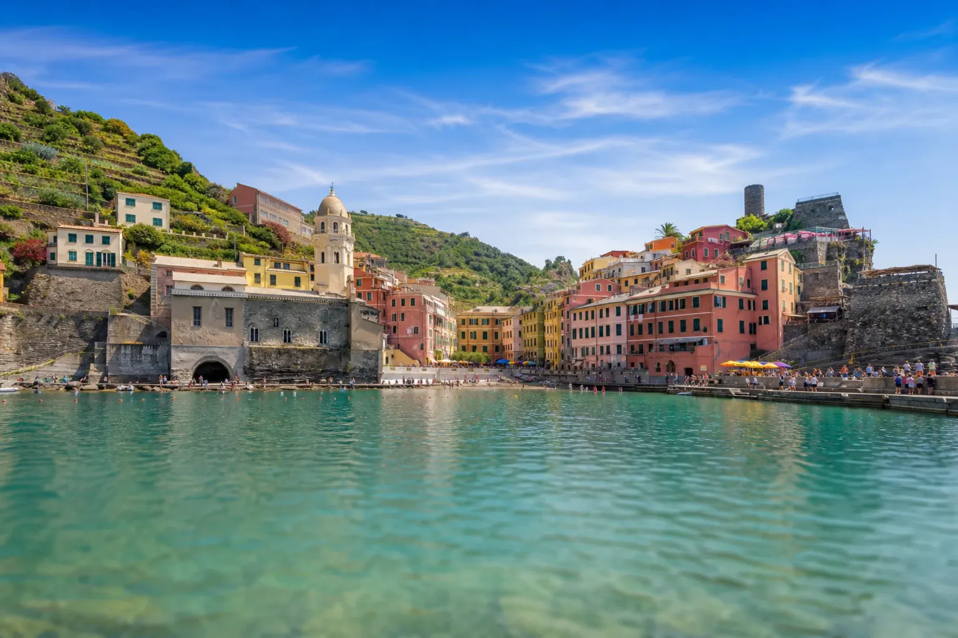 Italy-Colourful houses and harbour of Vernazza on a Cinque Terre Tuscany tour.