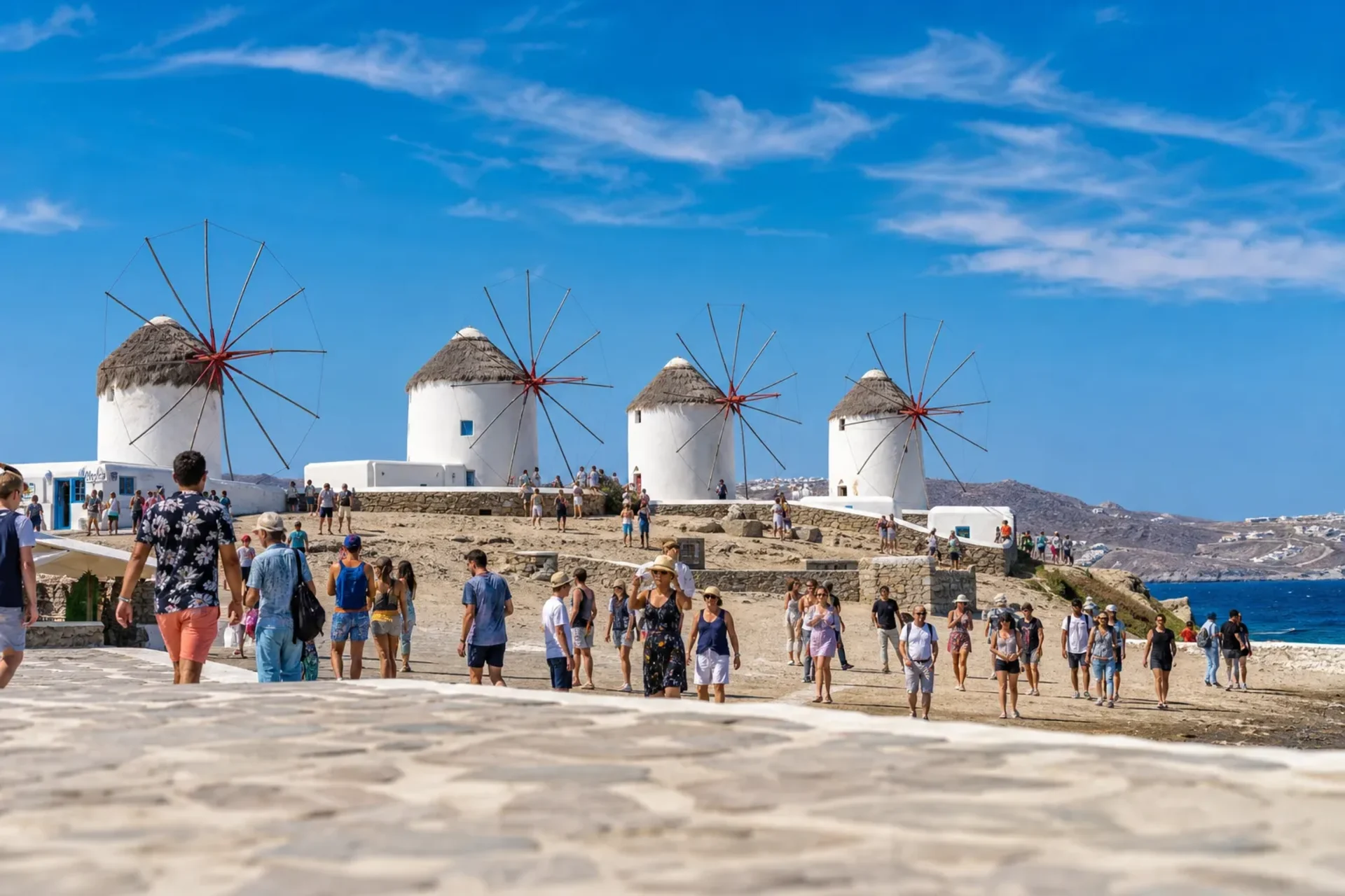 Italy, Greece & Turkey-The famous white windmills of Mykonos seen during a Greece Turkey Italy cruise.