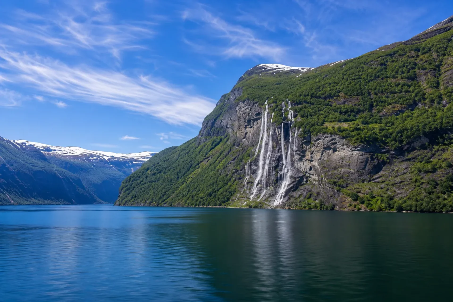Norway-A stunning view of the Geirangerfjord waterfalls showcasing the Norway coastal charms.
