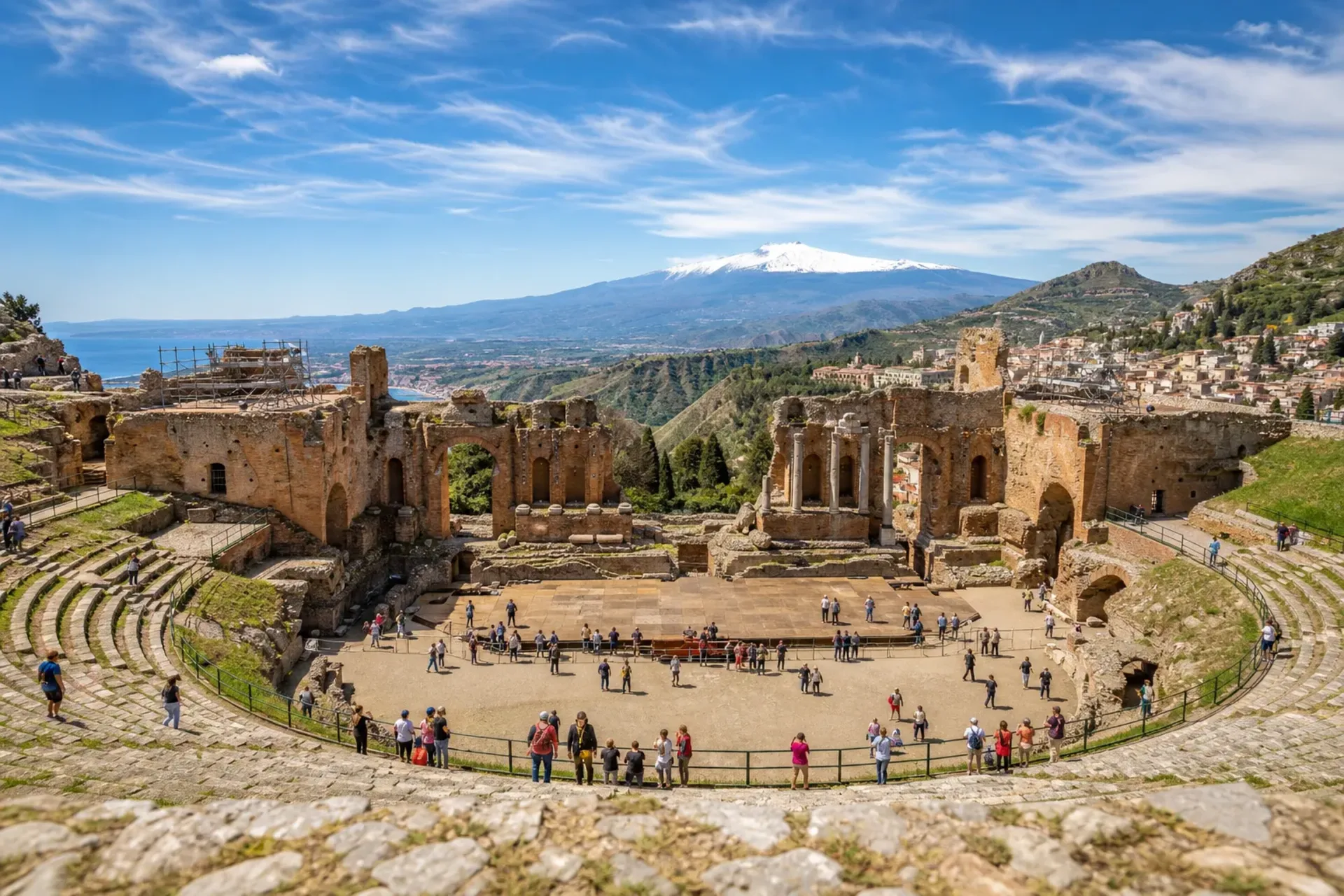 Italy-The ancient Greek Theatre in Taormina with Mount Etna in the background on a Sicily Aeolian Islands tour.