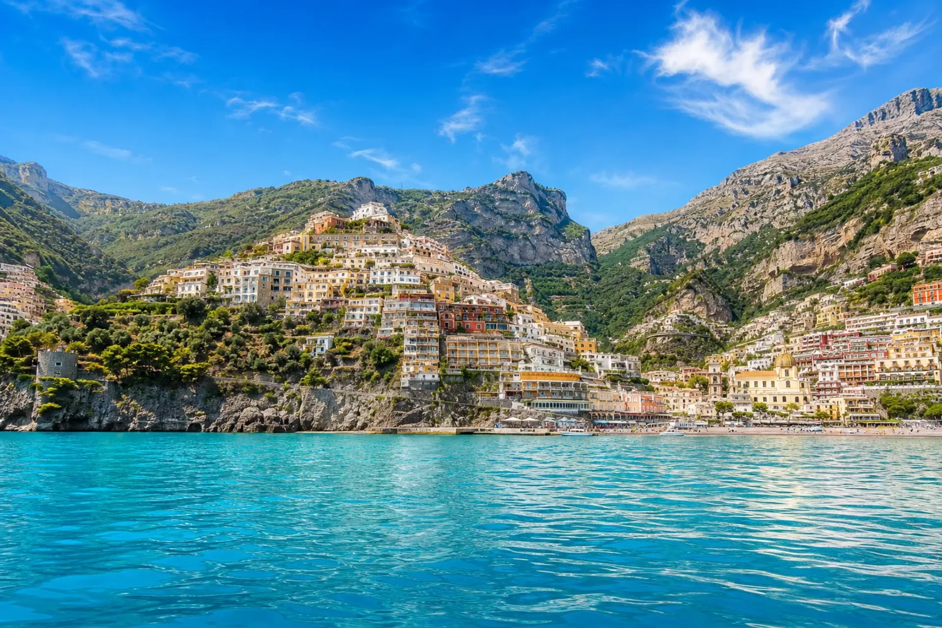 Italy-A panoramic view of the colourful cliffside architecture in Positano, a featured stop on our Sorrento Coast highlights tour.