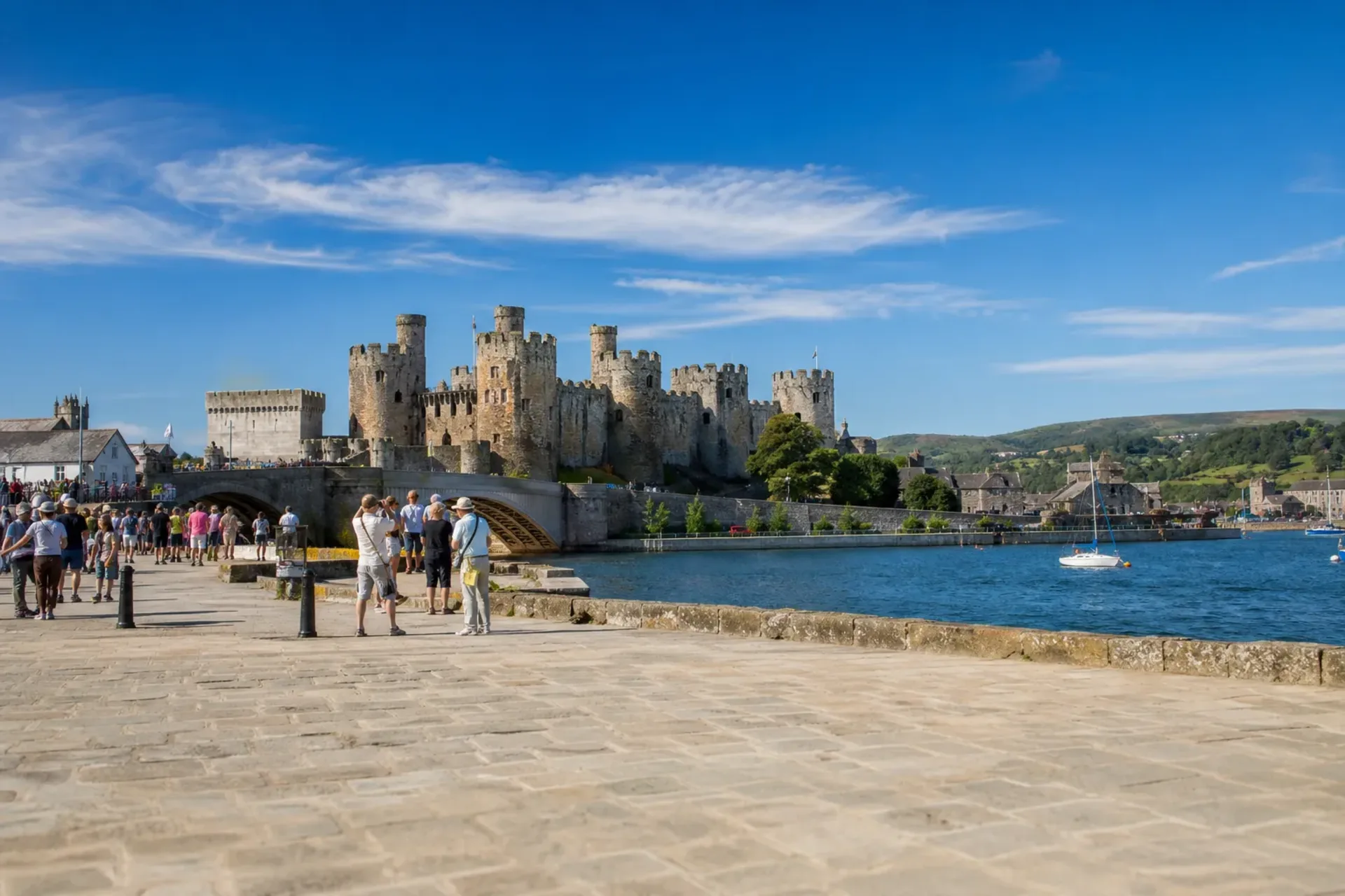 Wales-A sunny panoramic view of Conwy Castle in North Wales, a highlight of the Wonders of Wales tour.