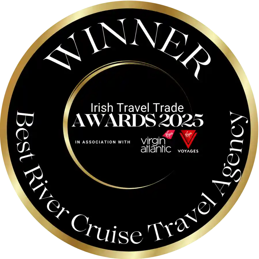 Circular award badge: 'Winner of Best River Cruise Travel Agency' at the Irish Travel Trade Awards 2025, in association with Virgin Atlantic and Virgin Voyages.