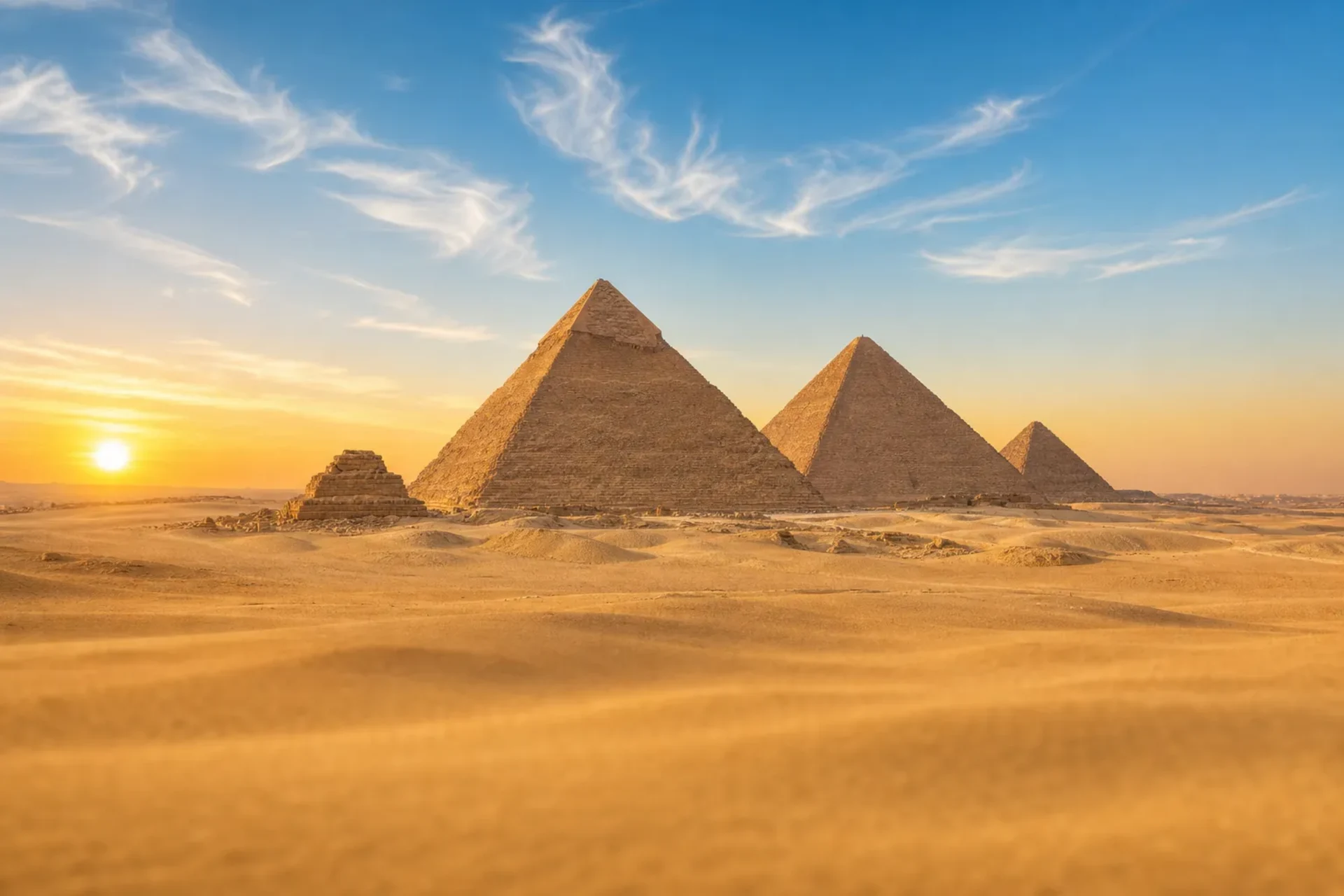 Greece and Egypt-The Great Pyramids of Giza under a bright blue sky on a Greek Isles Cairo cruise excursion.