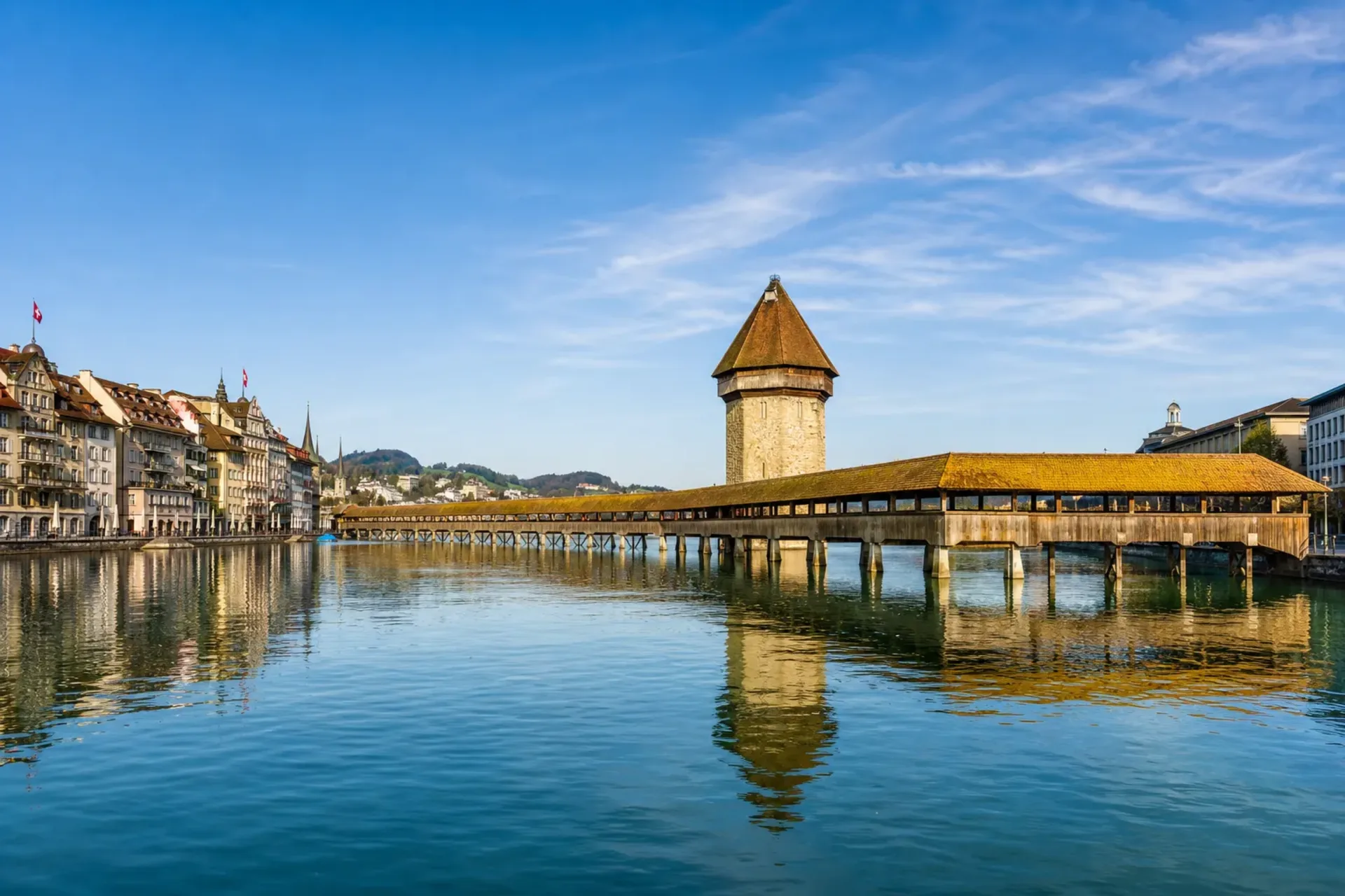 Switzerland & Germany-The historic wooden Chapel Bridge and water tower in Lucerne during a Rhine Cruise Switzerland.