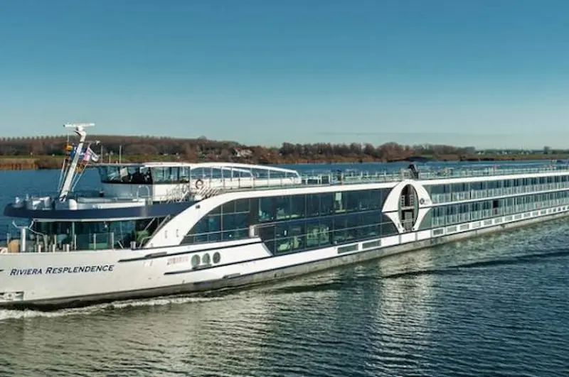 Riviera Resplendence luxury European river cruise ship sailing along a river waterway