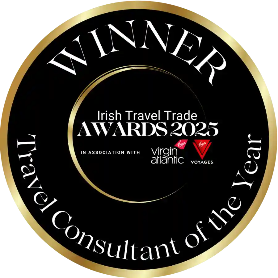 Circular award badge: 'Winner of Travel Consultant of the Year' at the Irish Travel Trade Awards 2025, in association with Virgin Atlantic and Virgin Voyages.