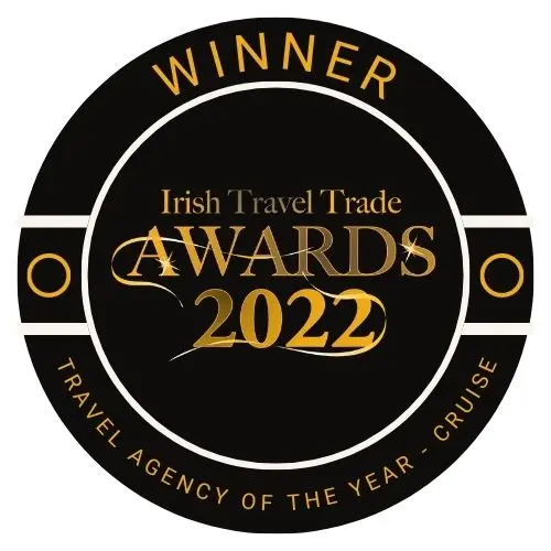 Circular award badge: 'Winner of Travel Agency of the Year - Cruise' at the Irish Travel Trade Awards 2022.