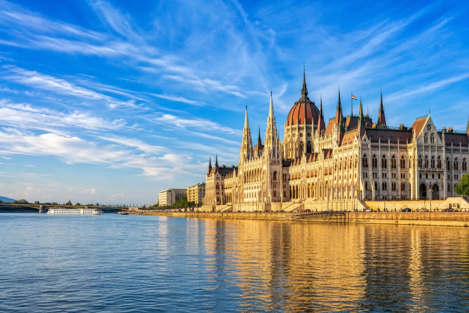 Europe-The Budapest Parliament building at sunset during a European Gems River Cruise.