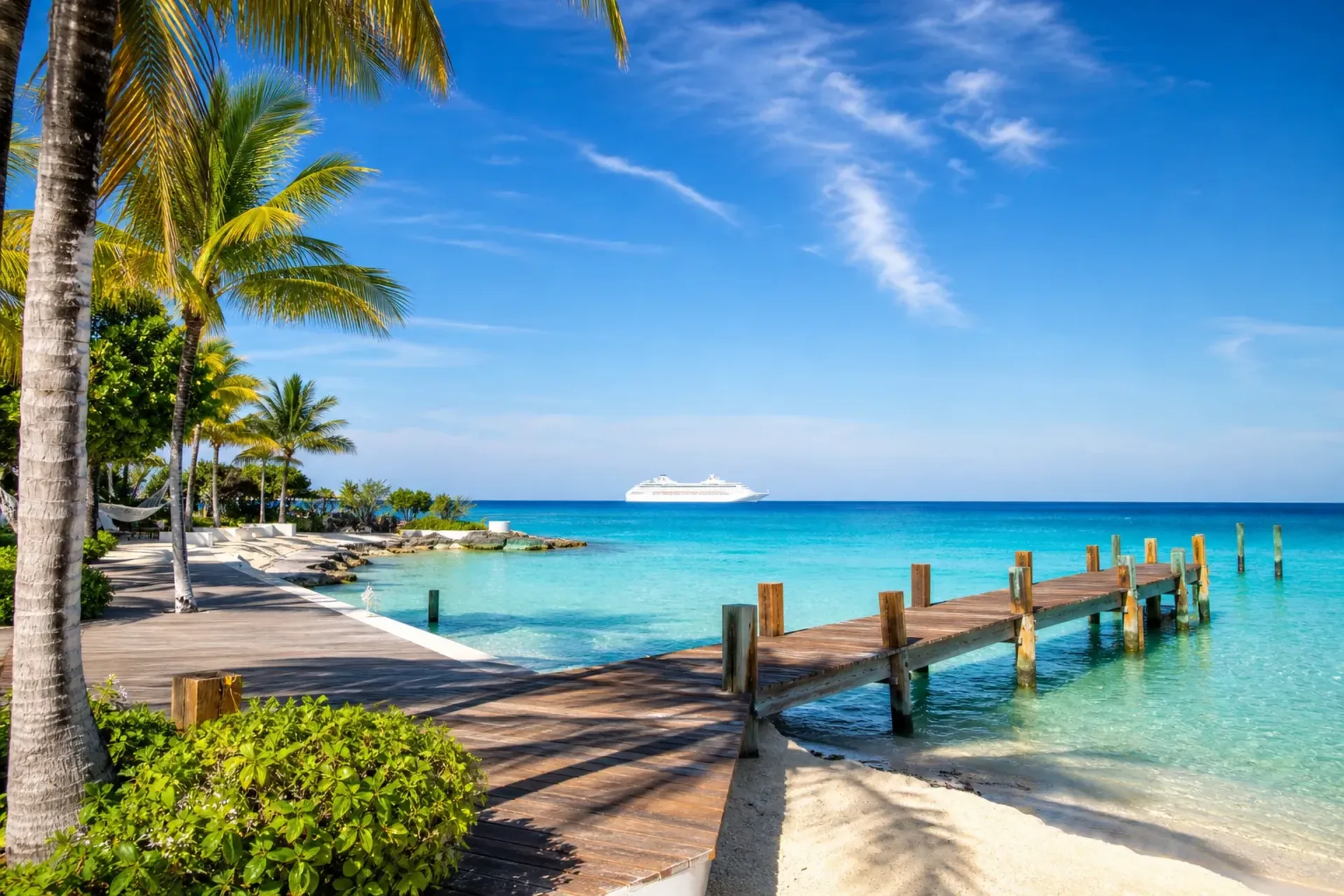 Florida and Bahamas-A generic cruise ship on the horizon of a tropical beach during a Florida Bahamas cruise.
