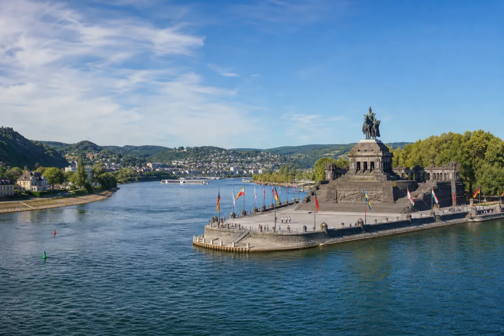 Germany-A scenic view of a Rhine river cruise route showing the confluence of the Rhine and Moselle rivers in Koblenz.