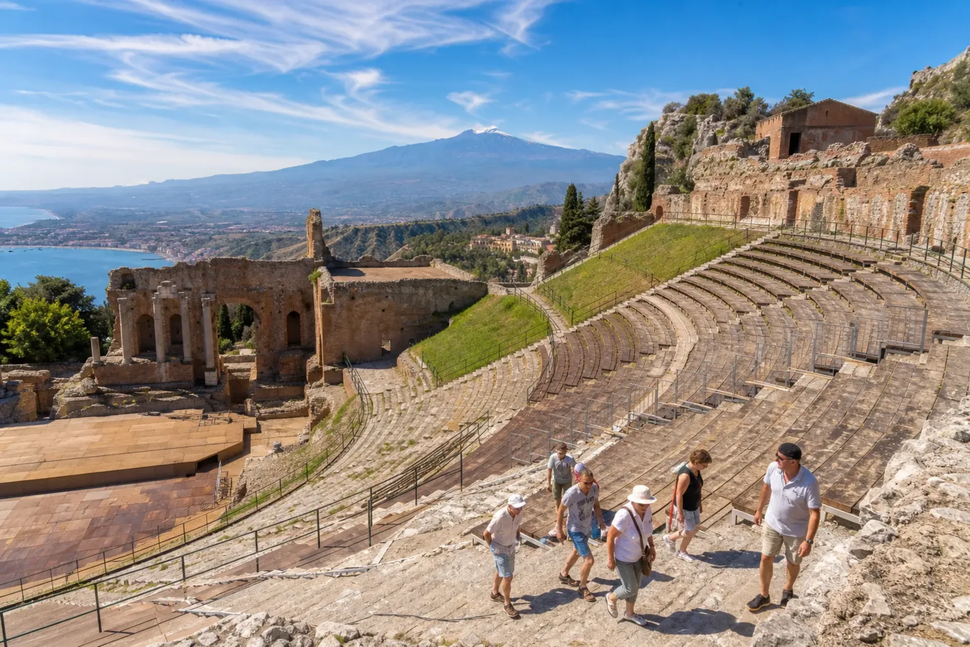 Italy-The ancient Greek Theatre in Taormina overlooking the coast on a Sicily guided holiday.