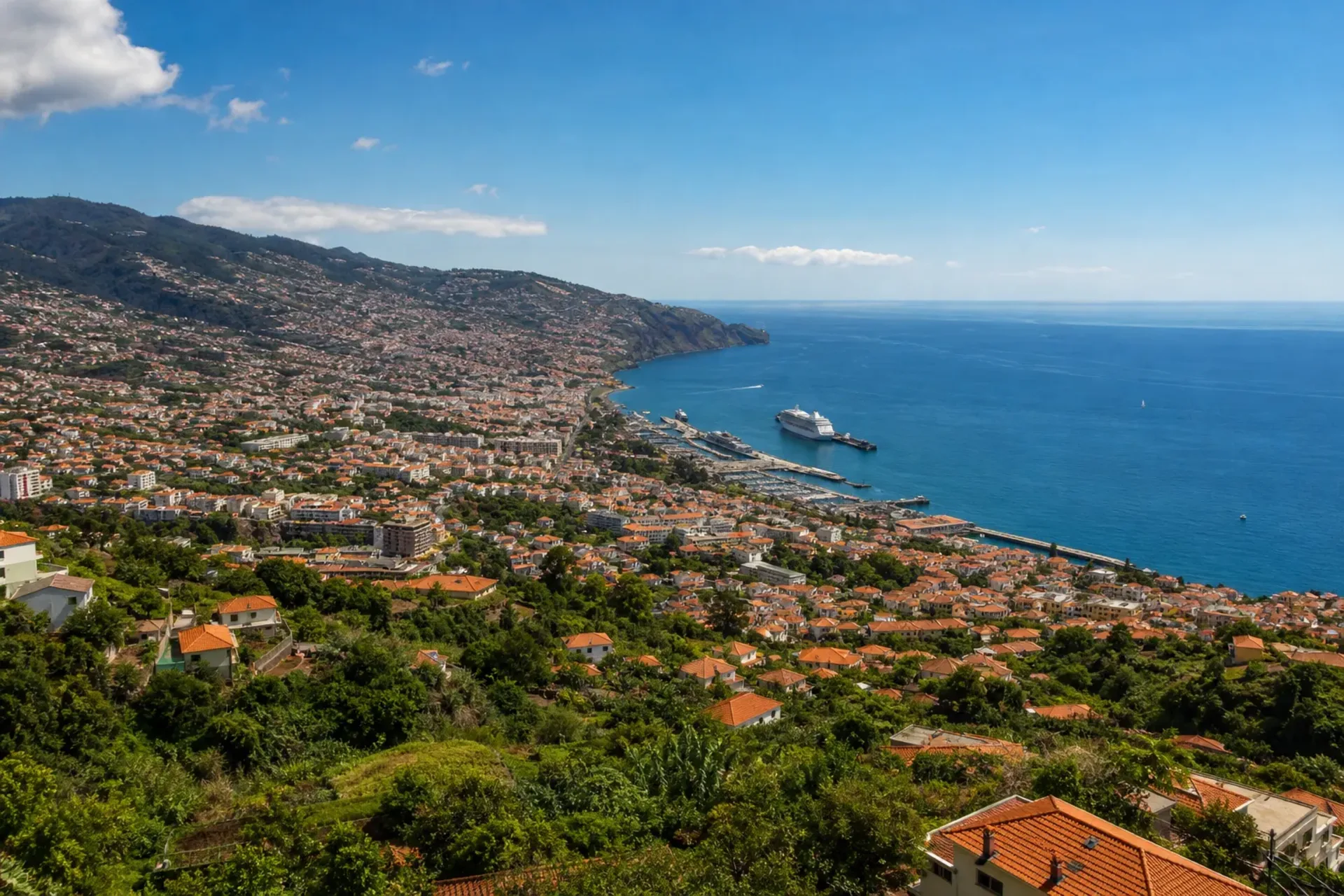Spain and Portugal-A scenic view of Funchal harbour in Madeira, a key stop on the Atlantic Islands Cruise.