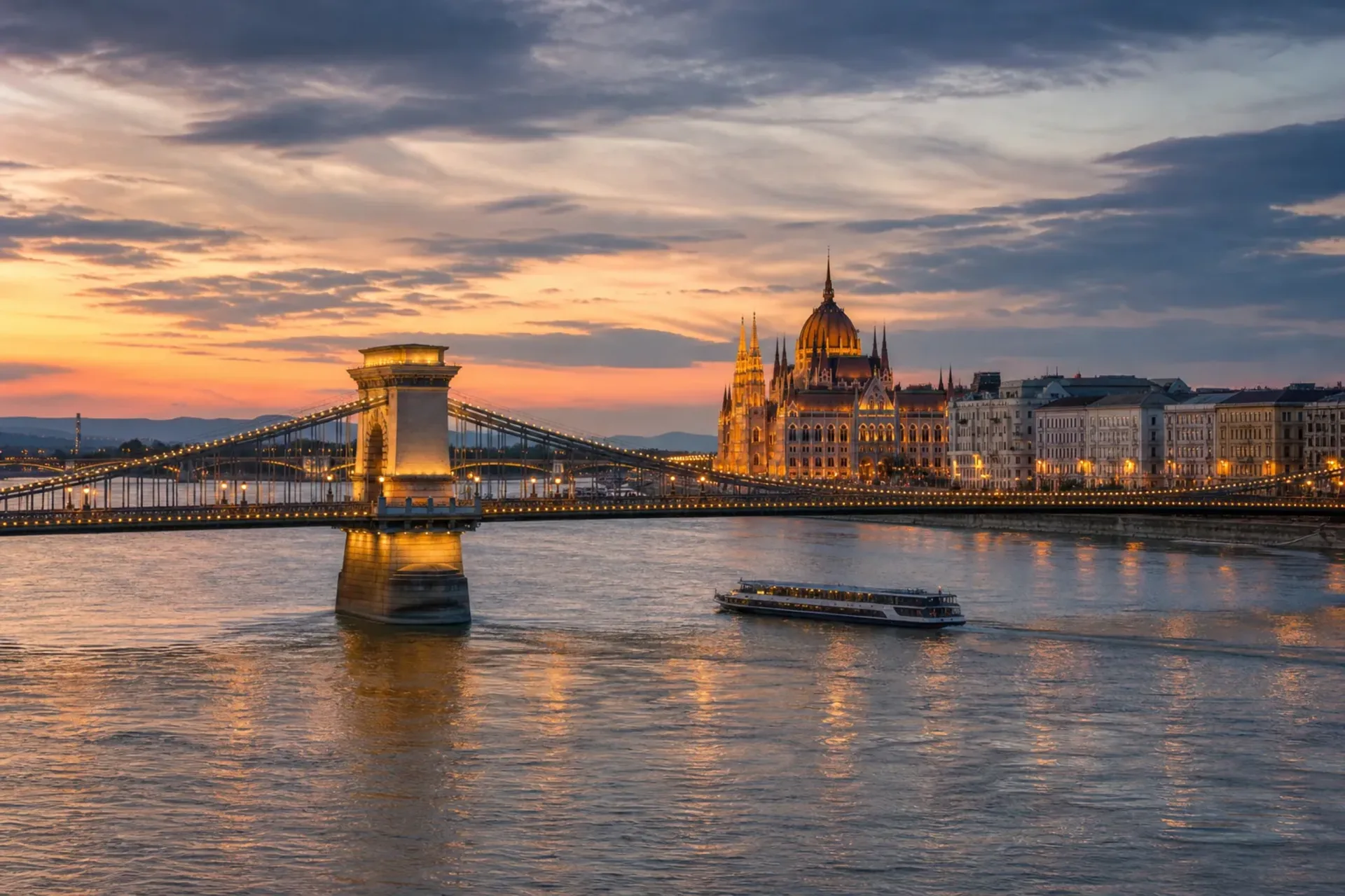 Hungary, Austria, Germany-A beautiful evening view of the Chain Bridge in Budapest, a key stop on our Danube River Cruise.