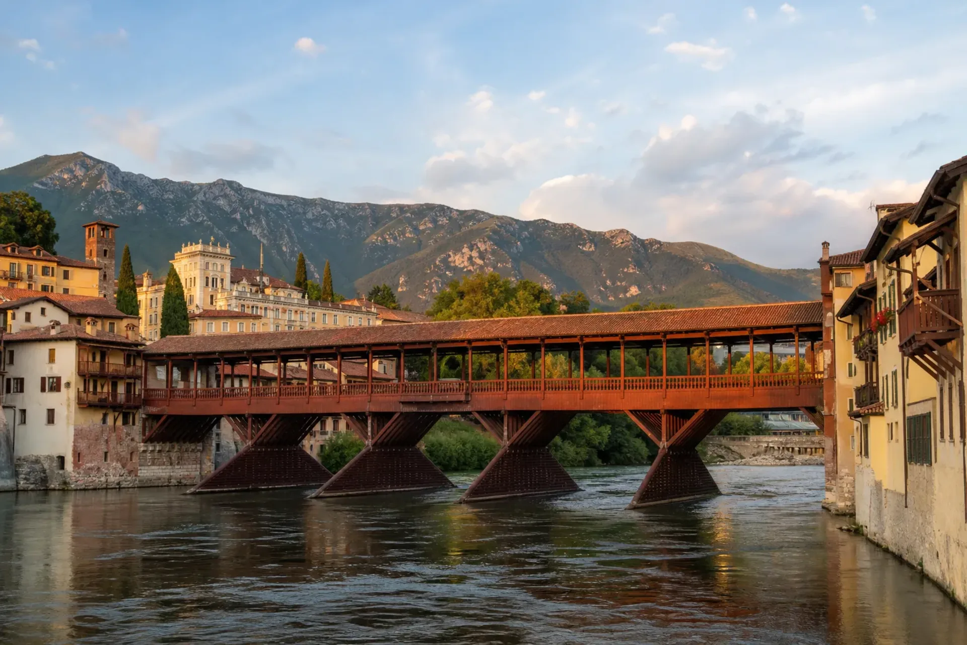 Italy-The historic wooden bridge of Bassano del Grappa on the river Brenta, a highlight of our Padua Vicenza tour.